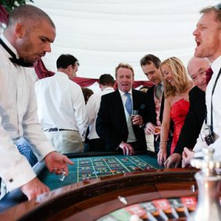 Wedding guests playing roulette